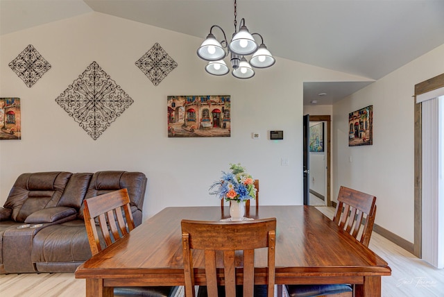 2966 Vermillion Way E, Helena, MT 59635 - dining room featuring vaulted ceiling, a chandelier, and light wood finished floors