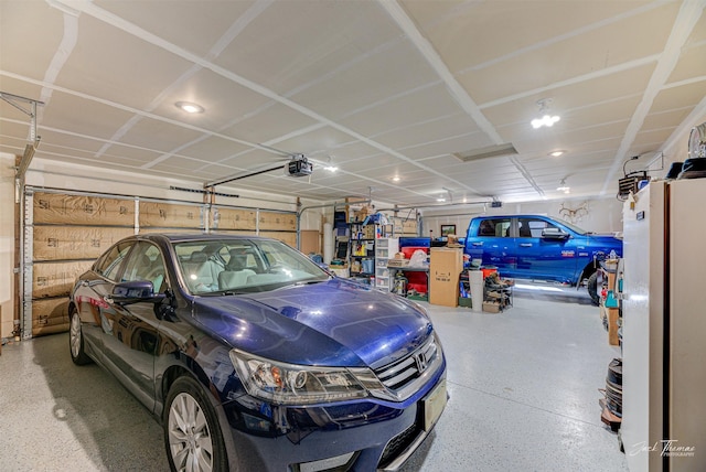 2966 Vermillion Way E, Helena, MT 59635 - garage with a garage door opener and recessed lighting