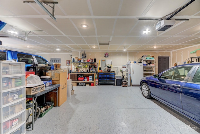 2966 Vermillion Way E, Helena, MT 59635 - garage with a garage door opener and recessed lighting