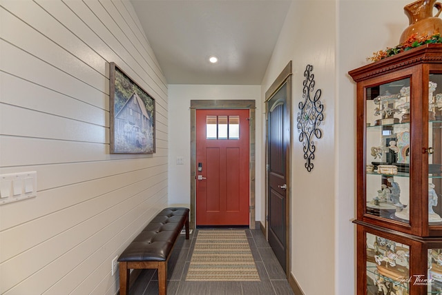 2966 Vermillion Way E, Helena, MT 59635 - doorway to outside featuring wooden walls, dark tile patterned floors, and recessed lighting