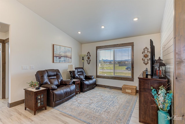 2966 Vermillion Way E, Helena, MT 59635 - living room with vaulted ceiling, light wood-style flooring, and recessed lighting
