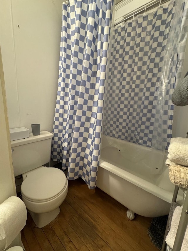 1100 Caledonia St, Butte, MT 59701 - bathroom with wood-type flooring, toilet, and shower / bath combo