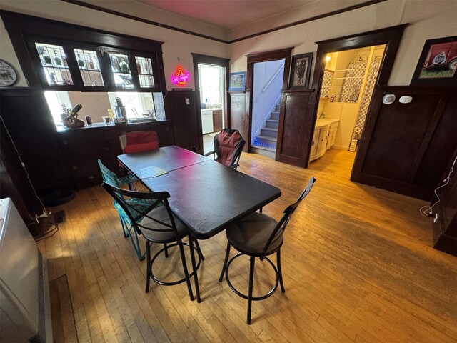 1100 Caledonia St, Butte, MT 59701 - dining space featuring hardwood / wood-style flooring, a desk, and stairs