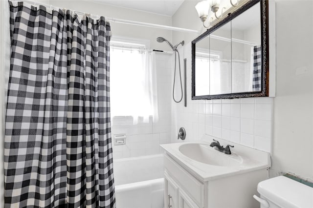 1320 1st Ave S, Great Falls, MT 59401 - bathroom with shower / tub combo with curtain, toilet, vanity, and tile walls