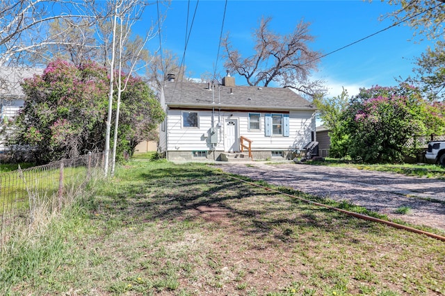 1320 1st Ave S, Great Falls, MT 59401 - rear view of property with fence and a chimney