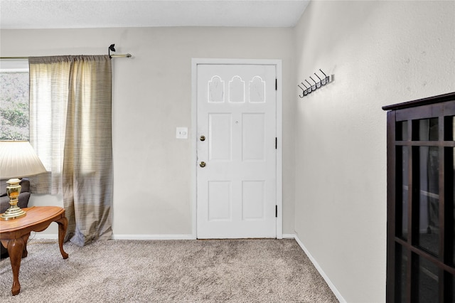 1320 1st Ave S, Great Falls, MT 59401 - foyer entrance featuring carpet and baseboards