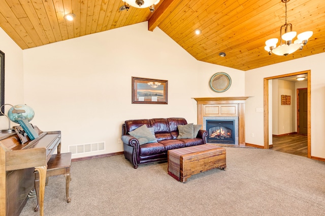 carpeted living room with a chandelier, baseboards, a fireplace with flush hearth, wooden ceiling, and recessed lighting