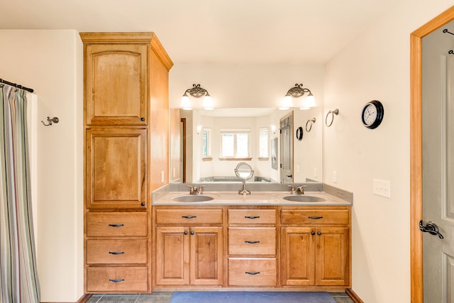 bathroom with double vanity