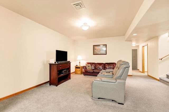 living room with carpet floors, stairway, and baseboards