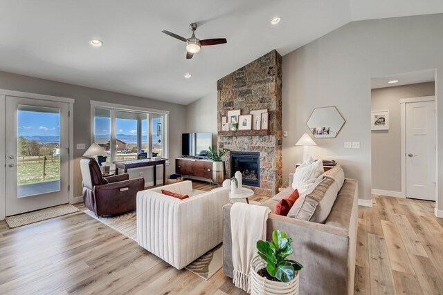 217 Spring St, Townsend, MT 59644 - living room featuring vaulted ceiling, ceiling fan, light wood-style flooring, a fireplace, and recessed lighting