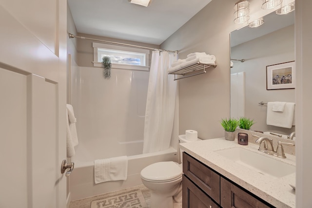 full bath featuring shower / tub combo, toilet, and vanity