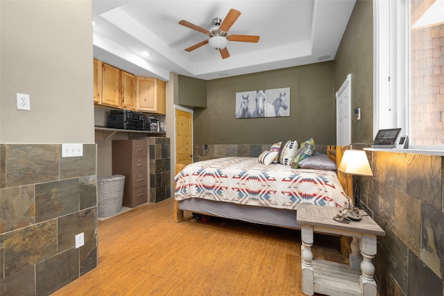 1492 Mcmannamy Draw, Kalispell, MT 59901 - bedroom with a tray ceiling and ceiling fan