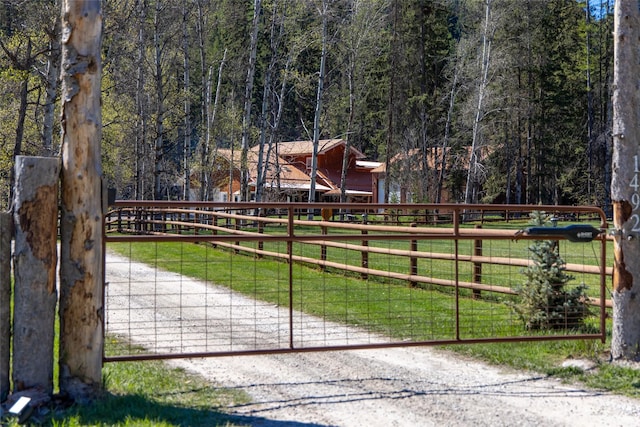 1492 Mcmannamy Draw, Kalispell, MT 59901 - gate featuring a forest view
