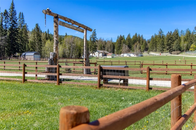 1492 Mcmannamy Draw, Kalispell, MT 59901 - view of yard with a view of countryside, a forest view, and an outbuilding