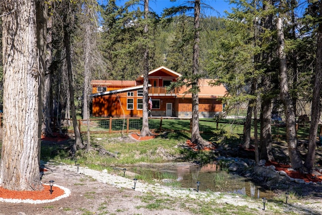 1492 Mcmannamy Draw, Kalispell, MT 59901 - view of front of property featuring a view of trees