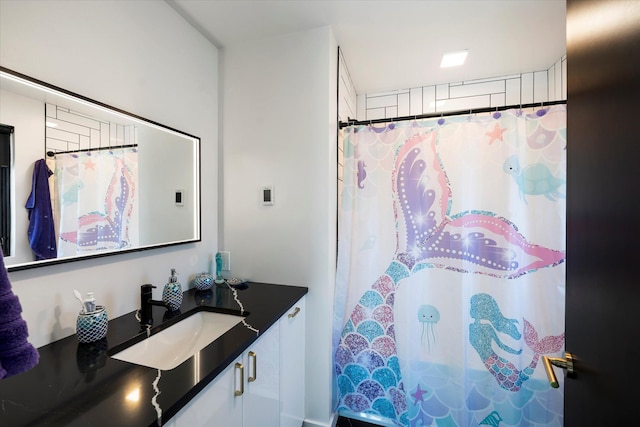 772 Denver St Unit A & B, Whitefish, MT 59937 - bathroom featuring vanity and curtained shower