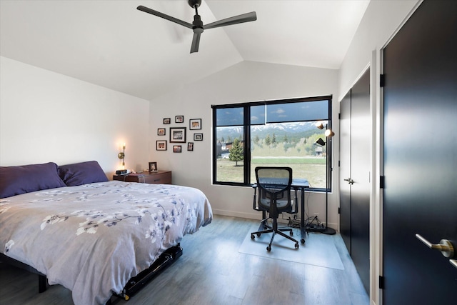 772 Denver St Unit A & B, Whitefish, MT 59937 - bedroom with wood finished floors, vaulted ceiling, baseboards, and ceiling fan