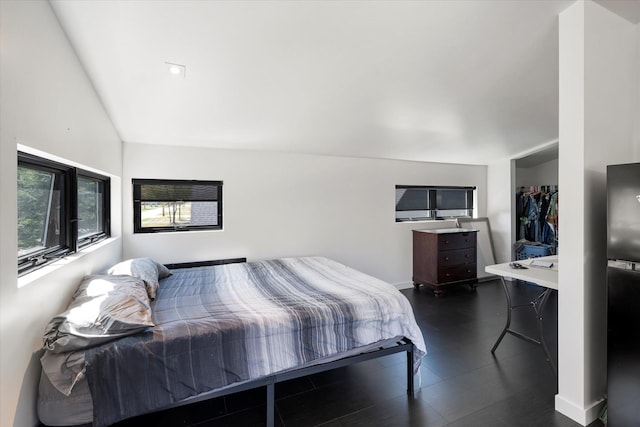 772 Denver St Unit A & B, Whitefish, MT 59937 - bedroom with dark wood-type flooring and lofted ceiling