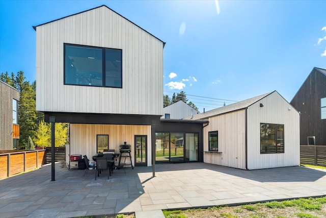 772 Denver St Unit A & B, Whitefish, MT 59937 - back of property with a patio area and fence