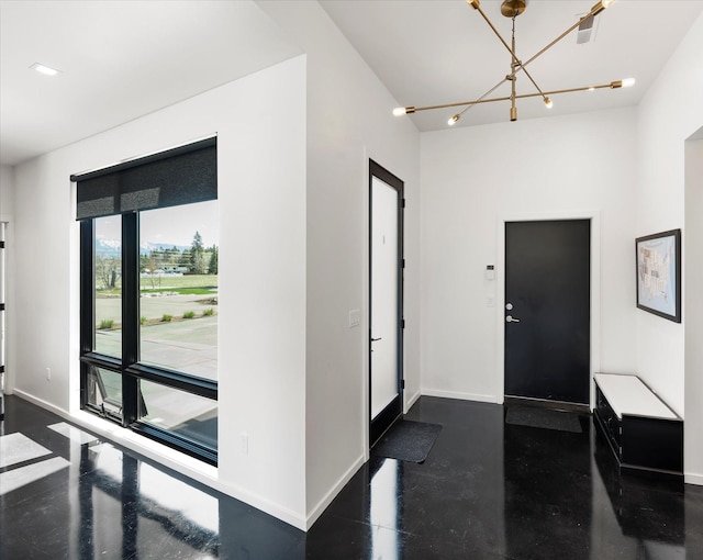 772 Denver St Unit A & B, Whitefish, MT 59937 - entrance foyer featuring baseboards and a chandelier