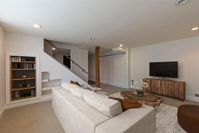 300 Evans Ave, Missoula, MT 59801 - living room featuring recessed lighting, baseboards, stairs, light colored carpet, and built in features
