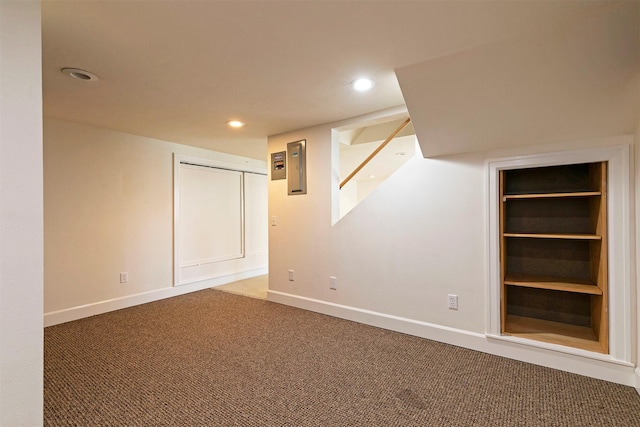 300 Evans Ave, Missoula, MT 59801 - finished below grade area with carpet floors, baseboards, recessed lighting, and electric panel