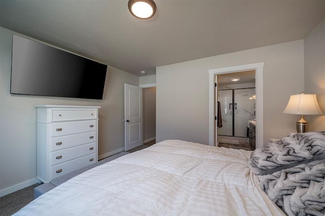 517 Raven Ln, Kalispell, MT 59901 - carpeted bedroom with baseboards and connected bathroom