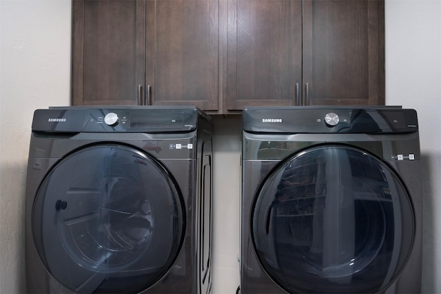 517 Raven Ln, Kalispell, MT 59901 - laundry area with separate washer and dryer and cabinet space