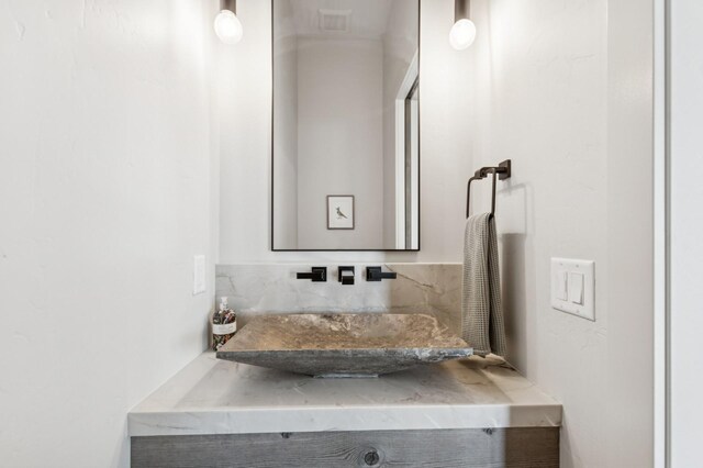 145 Elk Highlands Dr, Whitefish, MT 59937 - bathroom with tasteful backsplash