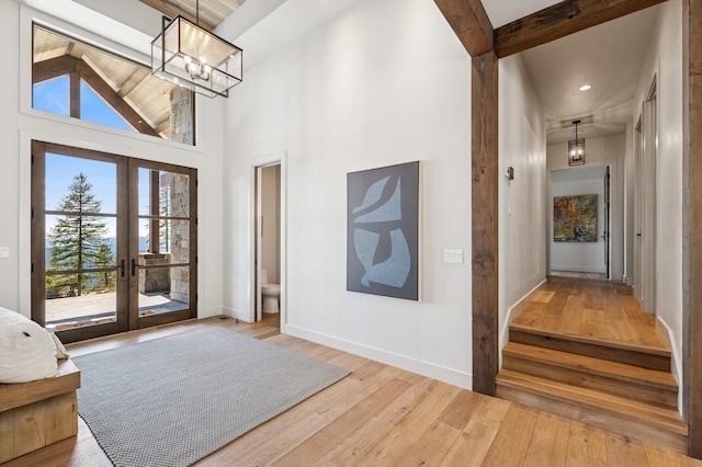 145 Elk Highlands Dr, Whitefish, MT 59937 - entryway featuring french doors, baseboards, hardwood / wood-style floors, a chandelier, and recessed lighting