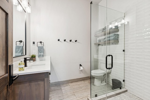 145 Elk Highlands Dr, Whitefish, MT 59937 - full bath featuring a shower stall, vanity, and toilet