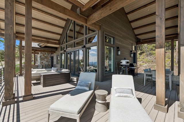 145 Elk Highlands Dr, Whitefish, MT 59937 - deck with an outdoor living space, outdoor dining area, and grilling area