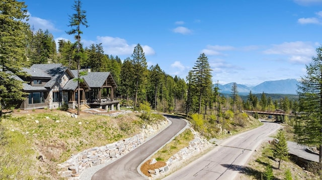 145 Elk Highlands Dr, Whitefish, MT 59937 - view of road featuring a mountain view and a forest view