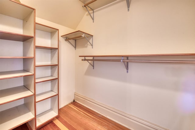 spacious closet with light wood-style flooring