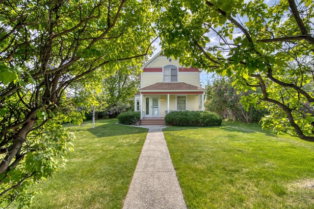 victorian house with a front lawn