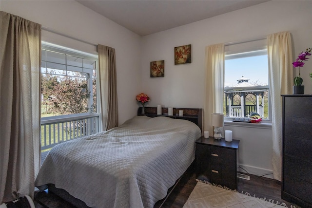 31 Aspen Ct, Kalispell, MT 59901 - bedroom with wood finished floors and baseboards