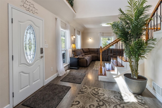 31 Aspen Ct, Kalispell, MT 59901 - entrance foyer with stairs, wood finished floors, and baseboards