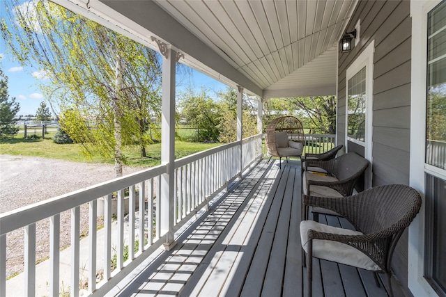31 Aspen Ct, Kalispell, MT 59901 - wooden terrace with a porch