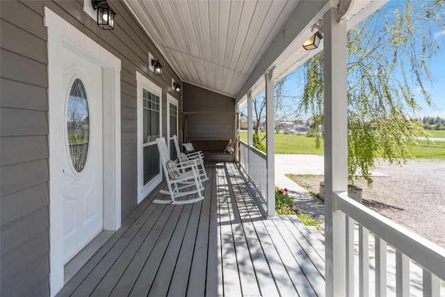 31 Aspen Ct, Kalispell, MT 59901 - deck featuring covered porch