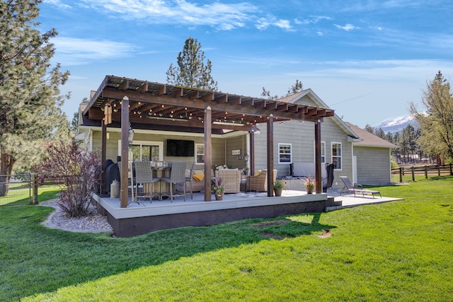 286 Ordway Dr, Florence, MT 59833 - back of property with a pergola, an outdoor living space, and a deck