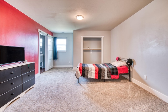 bedroom featuring carpet flooring and baseboards