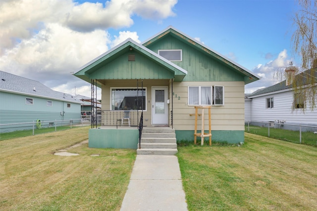 412 Spruce St, Anaconda, MT 59711 - bungalow-style house with a porch and board and batten siding