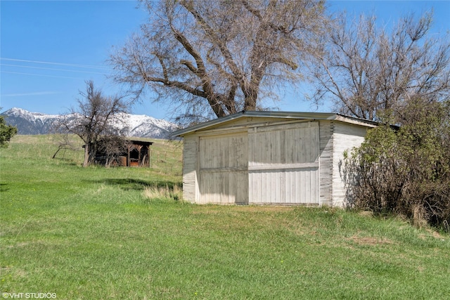 222 Lundeen Rd, Eureka, MT 59917 - view of shed featuring a mountain view