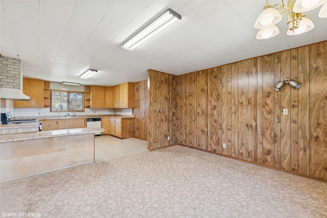 222 Lundeen Rd, Eureka, MT 59917 - kitchen with electric stove, open shelves, light countertops, wooden walls, and white dishwasher