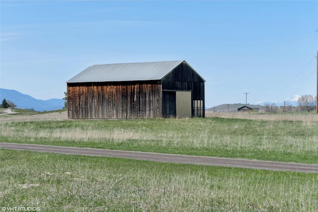 222 Lundeen Rd, Eureka, MT 59917 - view of pole building with a mountain view