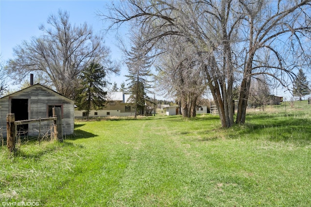 222 Lundeen Rd, Eureka, MT 59917 - view of yard featuring an outbuilding