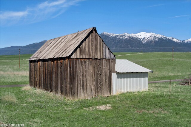 222 Lundeen Rd, Eureka, MT 59917 - view of outbuilding featuring a mountain view, an outbuilding, and a view of countryside