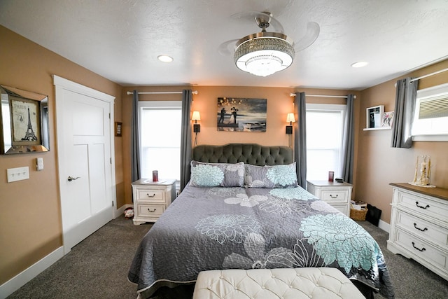 121 Choteau Ave NE, Great Falls, MT 59404 - bedroom with dark carpet, multiple windows, baseboards, and recessed lighting