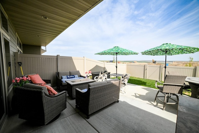 121 Choteau Ave NE, Great Falls, MT 59404 - view of patio featuring an outdoor hangout area, a fenced backyard, and a gate