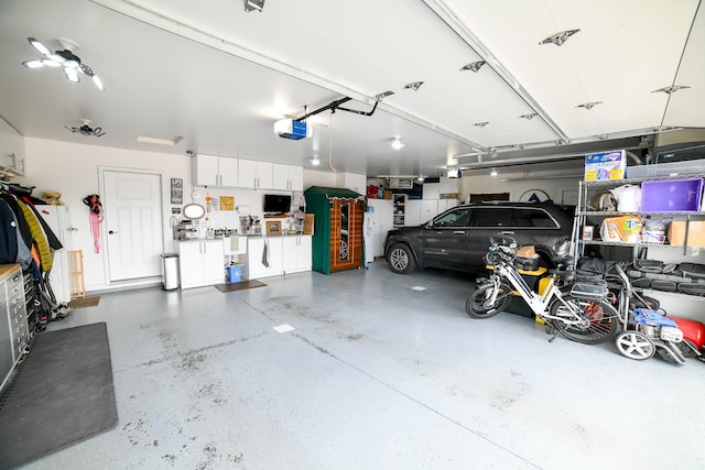 121 Choteau Ave NE, Great Falls, MT 59404 - garage featuring a garage door opener